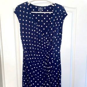 Knee length navy blue and white polka dot dress